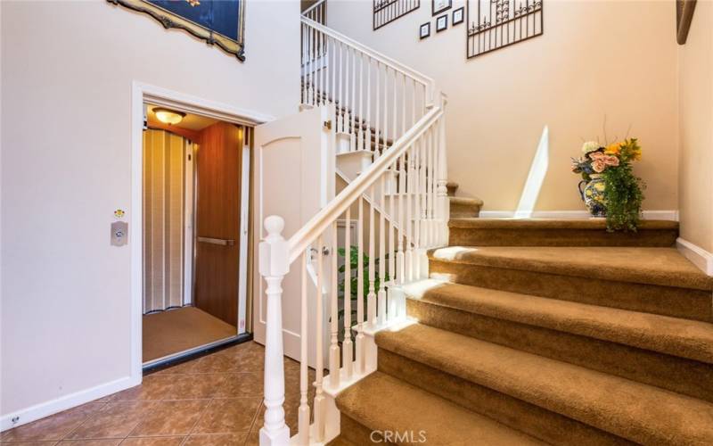 Your choice! Climb the stairs or use the 1-story private Elevator upon entry