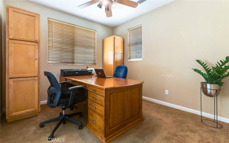 This spacious/open room may serve as a home/office as shown, or easily converted into third bedroom.