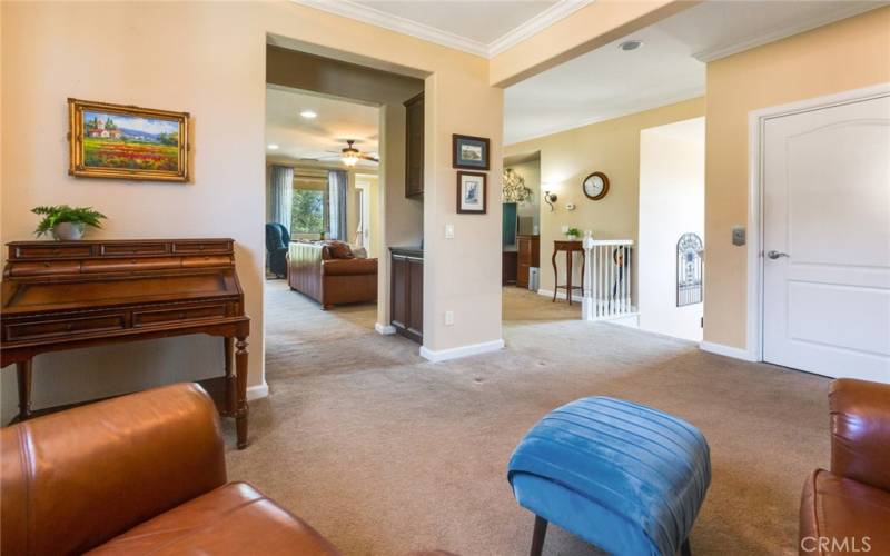 This Kitchen-adjacent room may be used as a Den, Library or Formal Dining Room, depending on personal life-style choices. Note Butler's Pantry at Doorway.