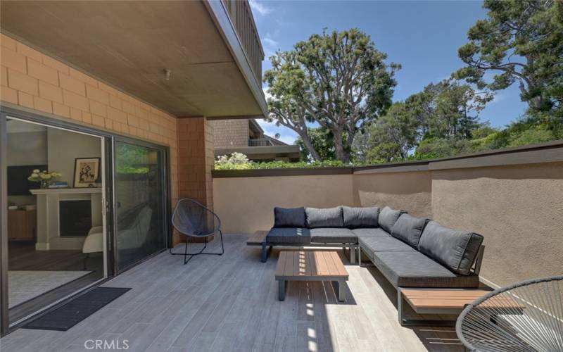 Another expansive patio that runs the width of the home.
