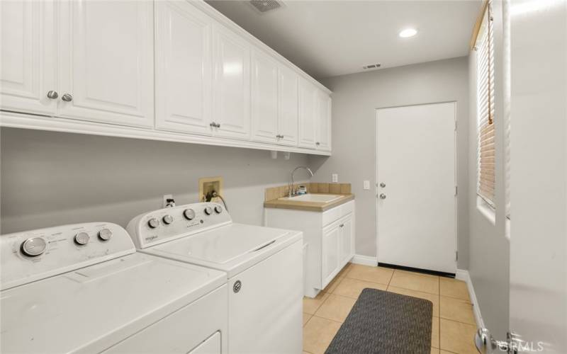 Main House Laundry Room with access to 2 Car Garage.