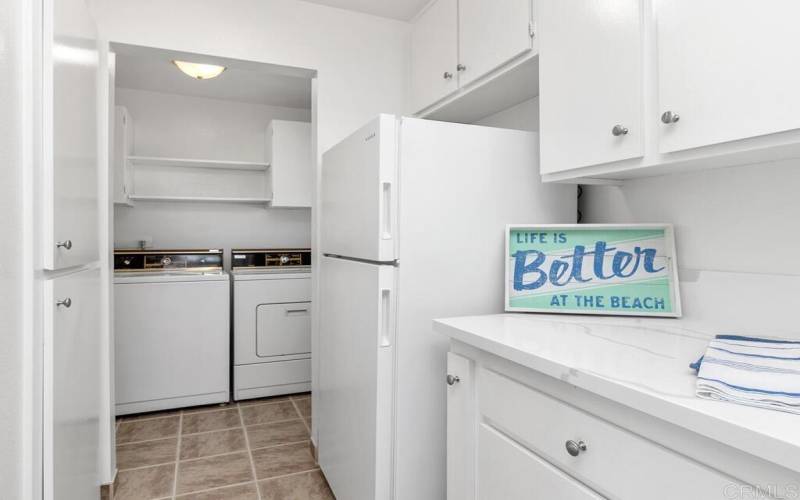 The Laundry Room is conveniently located in it's own room next to the Kitchen.
