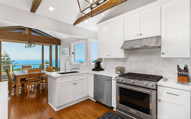 Kitchen with dining room beyond.