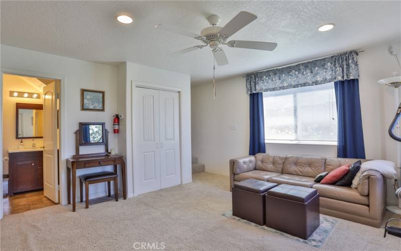 Family room looking at bathroom and laundry closet