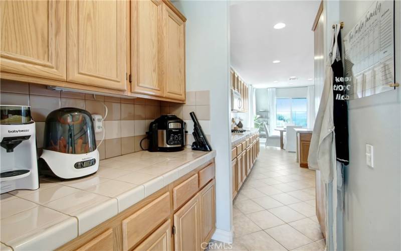 Separate pantry closet (right) and additional counter space for appliances...MORE STORAGE!