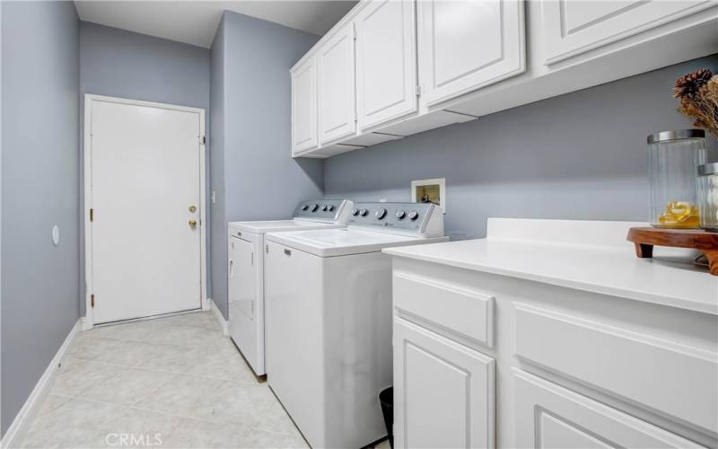 Nice sized laundry room w/ access to garage.