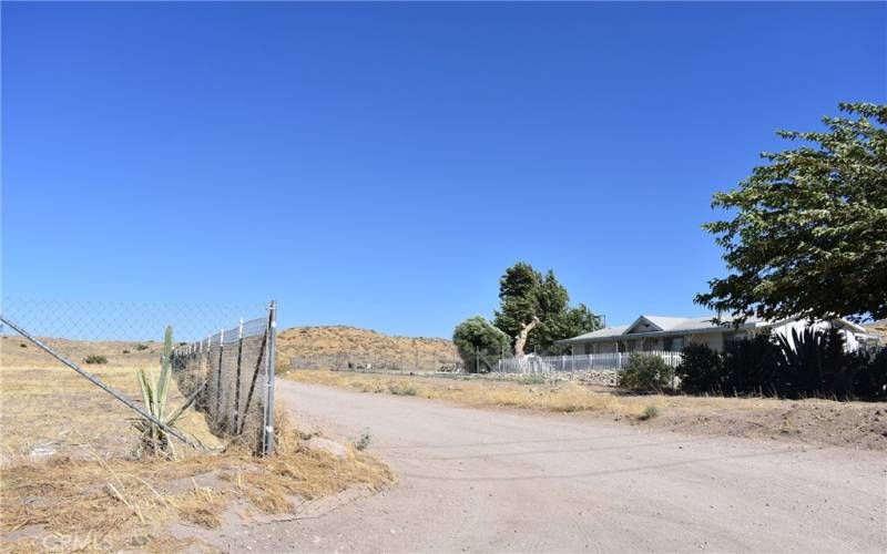 Follow road behind home at Small Rd & Rush Cyn