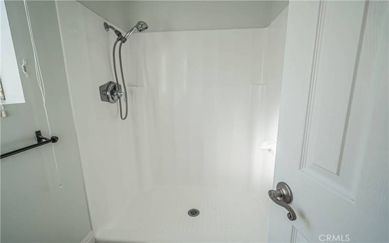 Separated shower and toilet area