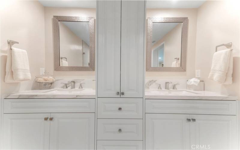 Primary bath, seamless glass walk in shower and tile surround