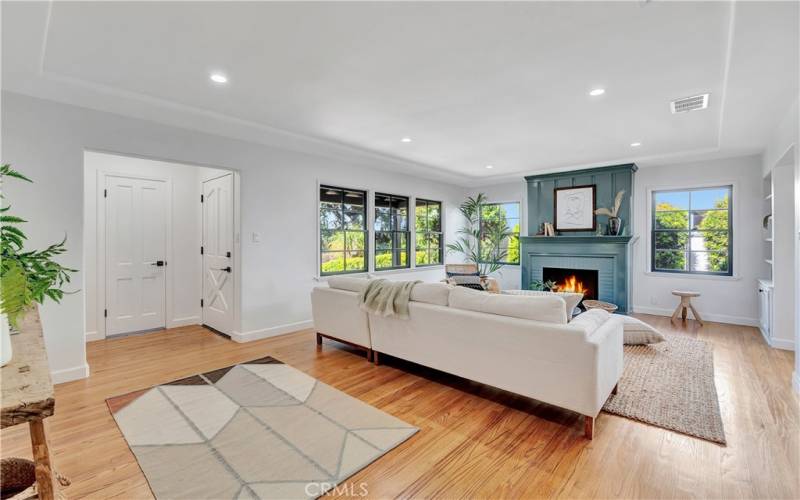 Living/Family room with fireplace and raised tray ceiling