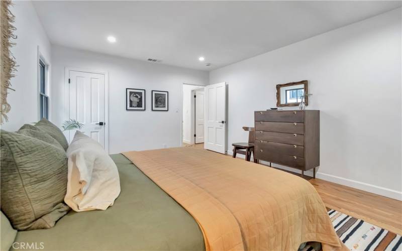 Bedroom 2 with direct access to the backyard and large glass sliding door