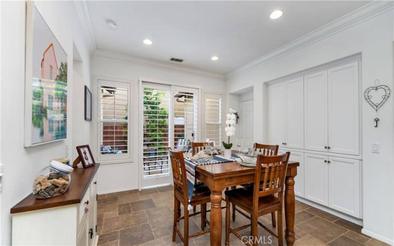 The dining area has plenty of room and additional storage.