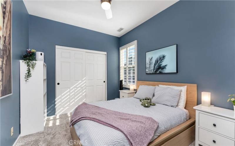 Bedroom 3 has a ceiling fan and new carpet.