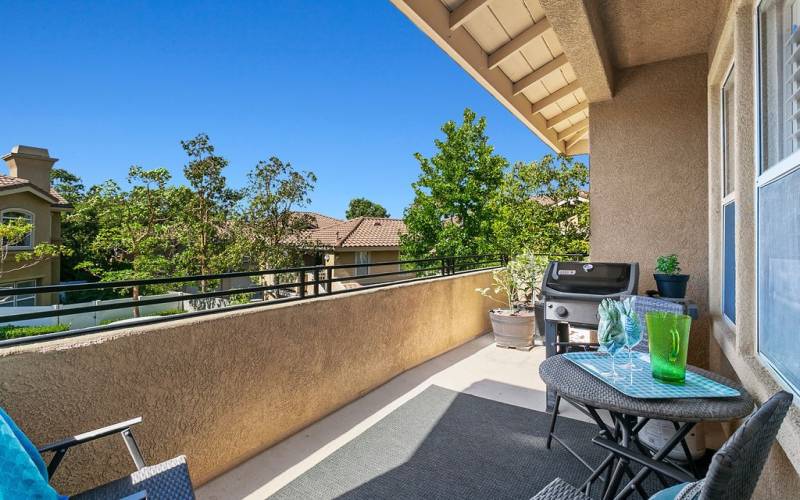 Enjoy the outdoors on your private partially covered deck overlooking the neighborhood