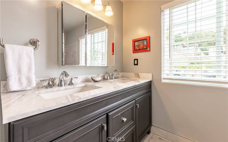 This fully remodeled bathroom serves the two secondary bedrooms and is a guest bathroom you will be proud to share!