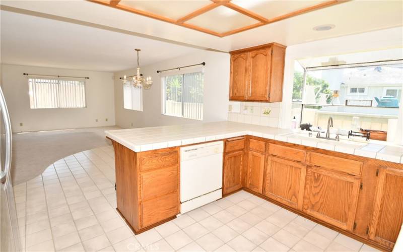 Kitchen opens up to large family room to entertain in.