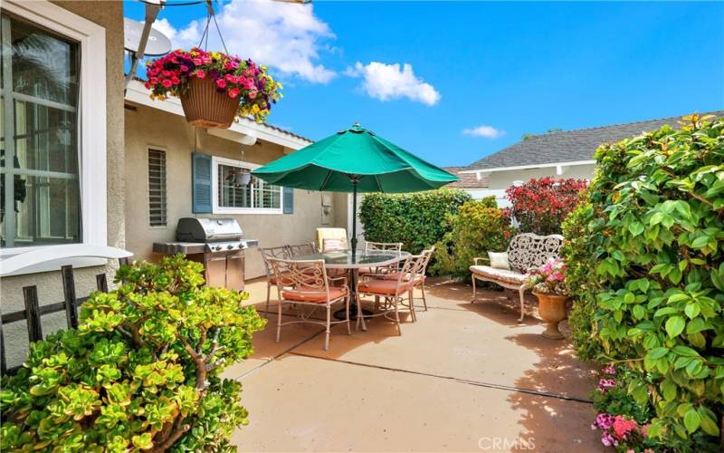 Lush private backyard exudes serenity.