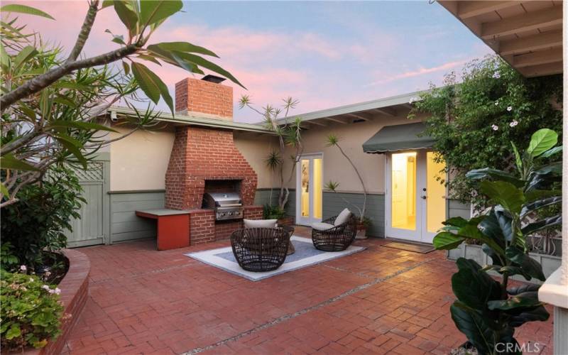 Relax in the spacious courtyard with built-in BBQ