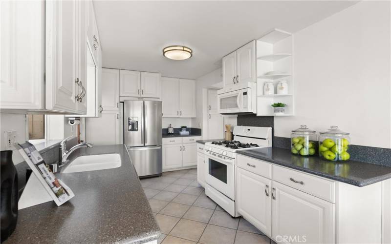 Reimagined kitchen with white Shaker cabinetry