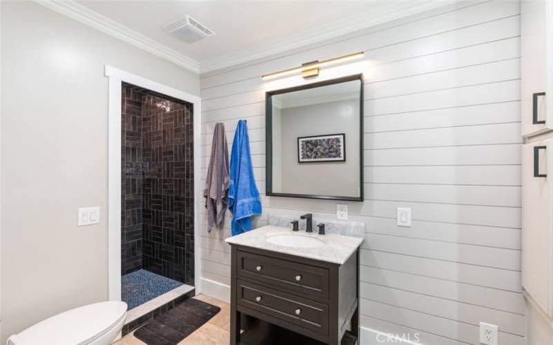 Bathroom 3 with walk in shower and adorable window bench