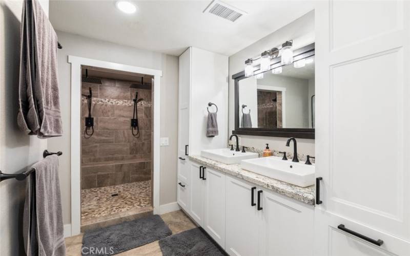 Primary Bathroom with Dual sink and vanity area