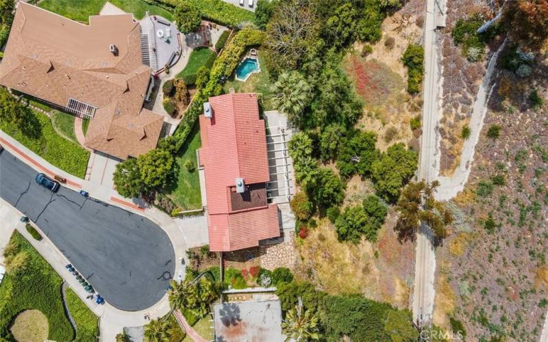 Birds-eye view of property and Protective Swale on slope