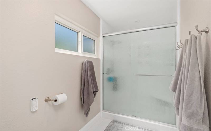 The primary bath also has a separate shower.