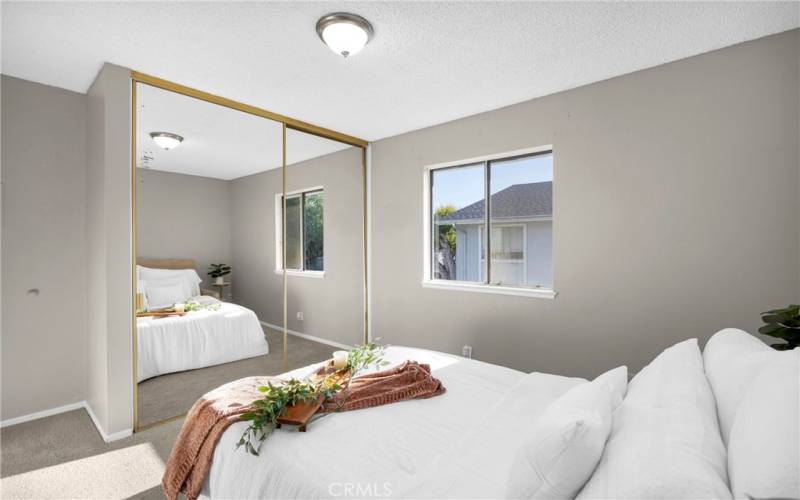 2nd bedroom, huge closet and mirror doors, ample natural lighting