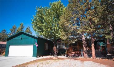 Welcome Home! Front view of this ready to move in 3 bedroom, 2 bath home on a 7,000 square foot lot! 2 car direct access garage has high ceiling for extra storage potential!