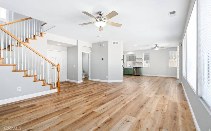 Step inside to an open floor plan with beautiful wood flooring