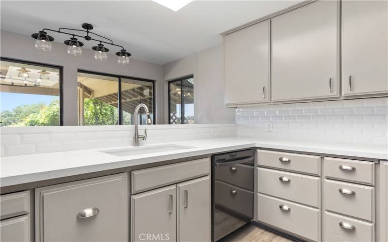 Thoughtfully remodeled kitchen, including new appliances and LVP flooring.