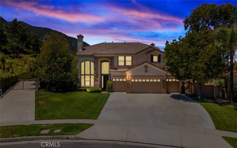 Stunning two-story home with a three-car garage, nestled in a serene neighborhood.