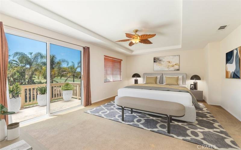 Stunning master bedroom with a private balcony, offering serene views and abundant natural light.