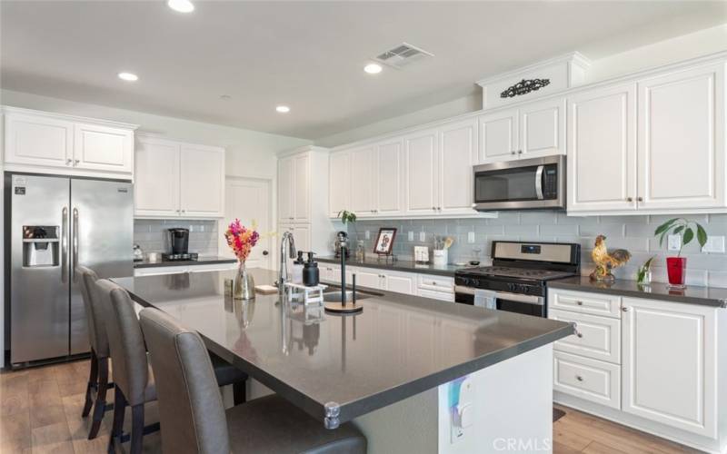 The spacious kitchen is ideal for casual dining and entertaining.