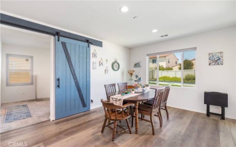 The dining area offers a charming and inviting space for family meals.