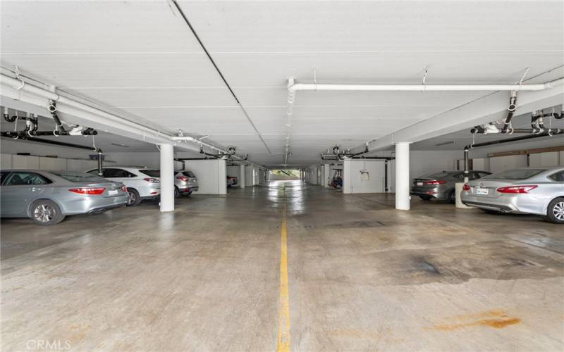 An underground garage protects your car from the elements and features oversized parking spaces and plenty of storage cabinets.