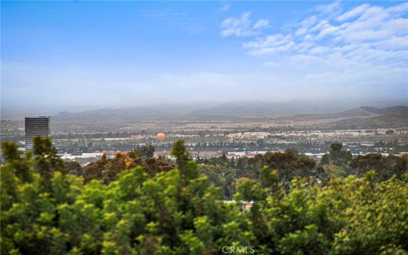 The panoramic views provide vistas of the Irvine Great Park and beyond.