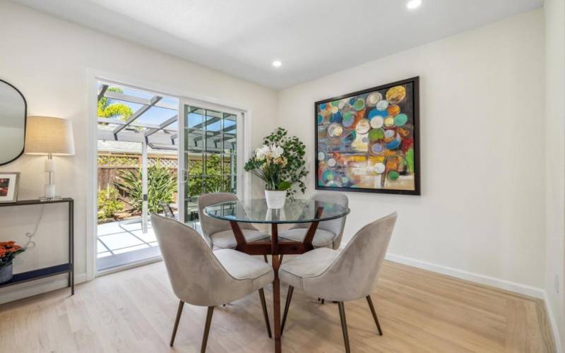 Dining Area leads to trellised patio.