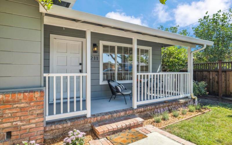 Covered front porch welcomes you.