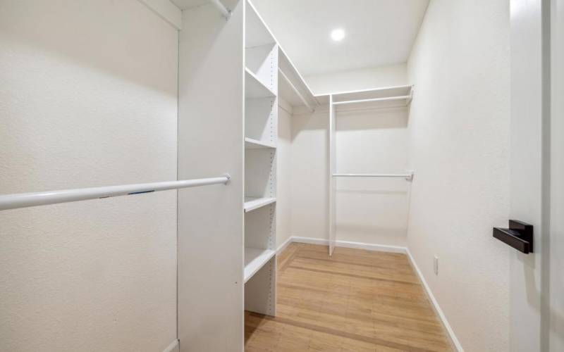 Primary Bedroom walk-in closet.