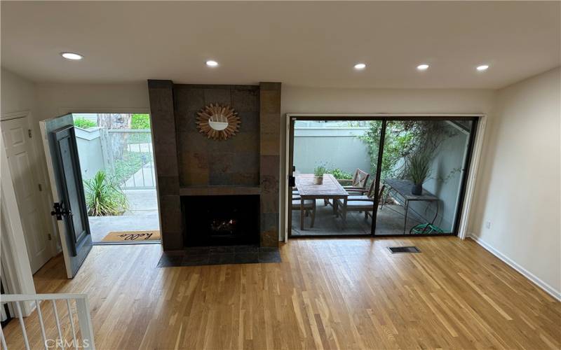 Living room with vaulted ceiling and skylights