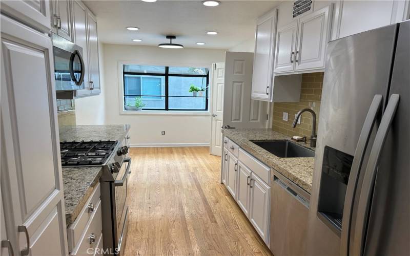 Kitchen with breakfast area and greenhouse window