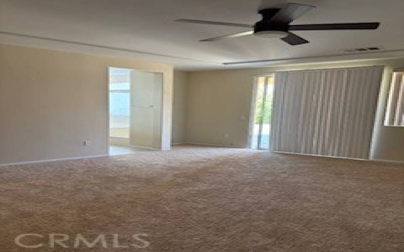 Primary Bedroom with slider to backyard.