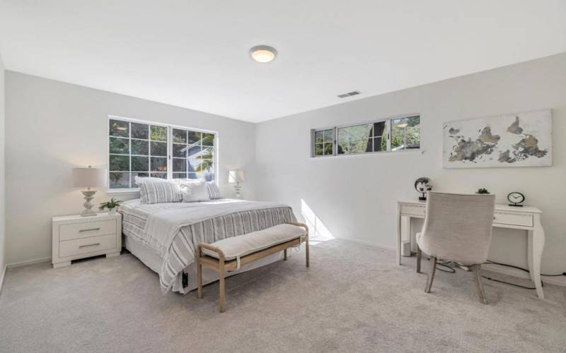 Secondary bedroom with new carpeting and fresh paint