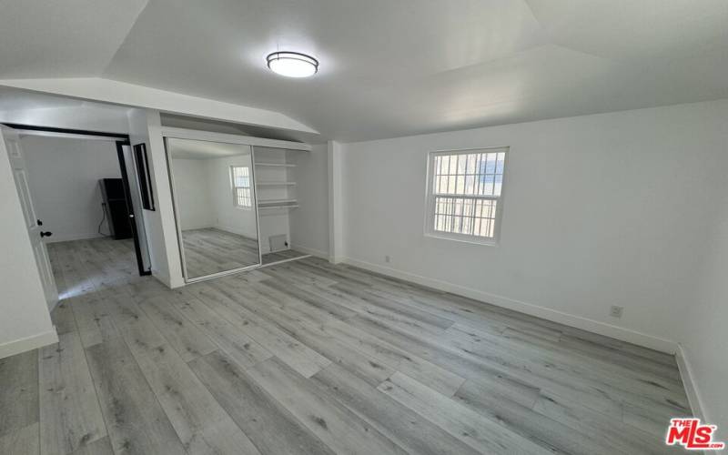 Glass Partition Separates Kitchen area