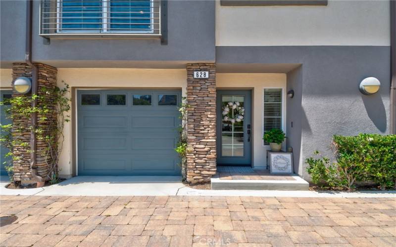 Front door and 2 car tandom garage