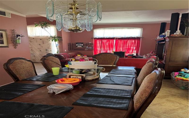 Full view of dinning room, tile flooring.