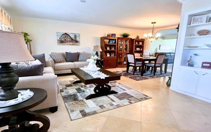 Entry Room with double pane windows, crown molding, tile floors.