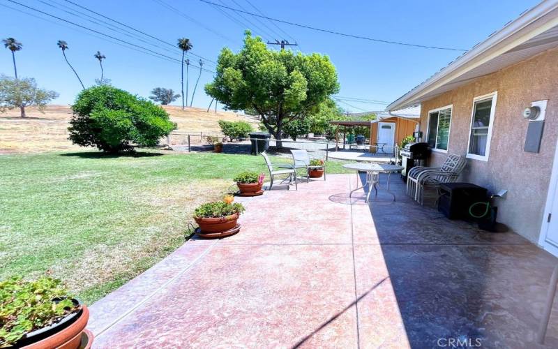 Patio Area with grass lawn.