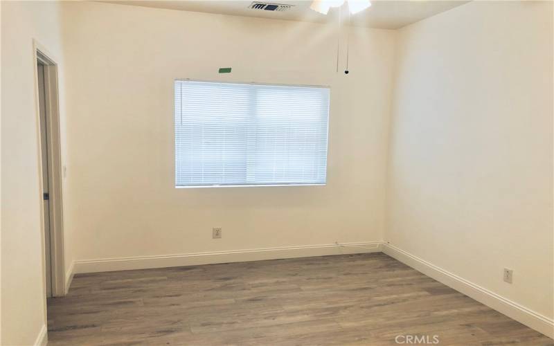 Guest bedroom with walk-in closet